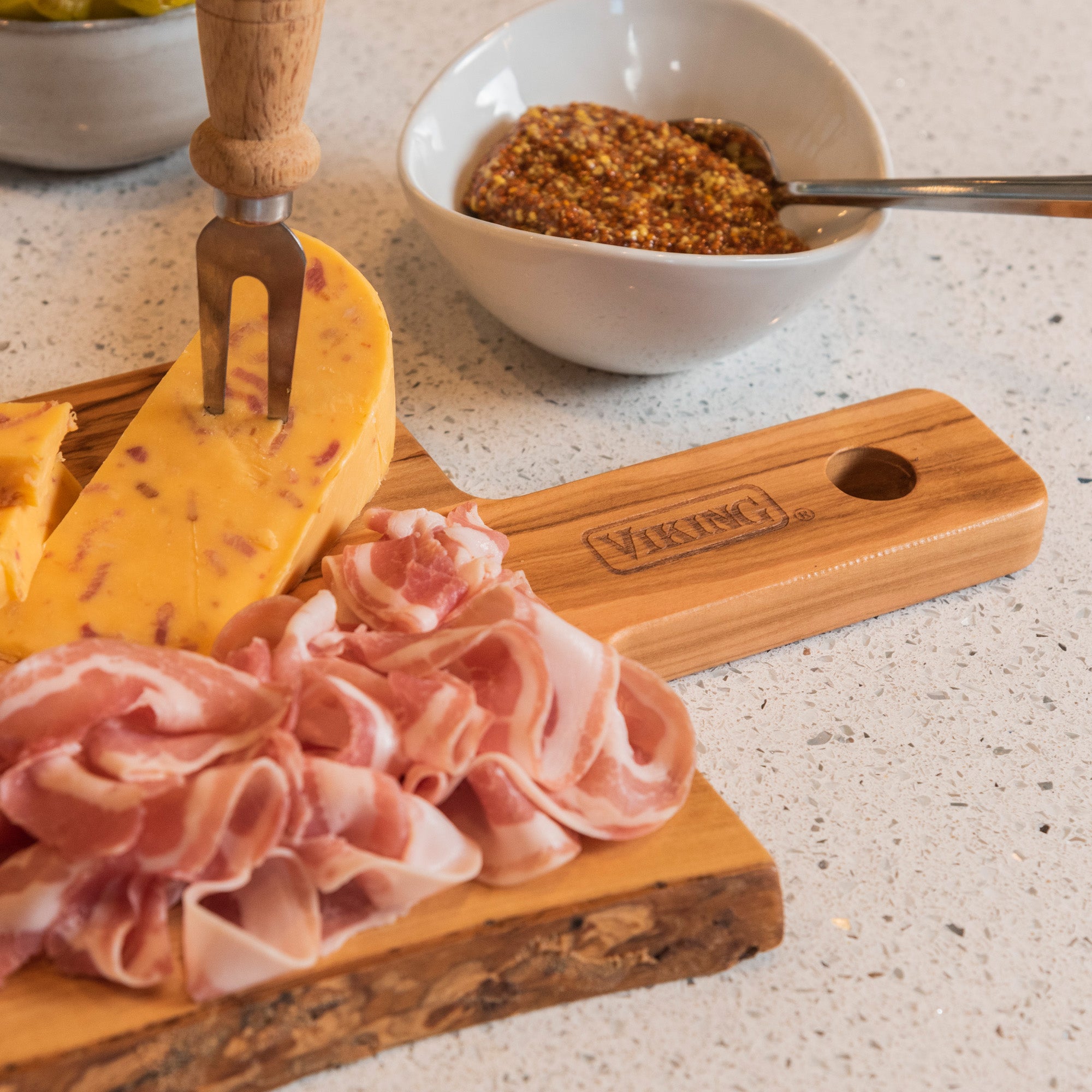Paddle cheese and charcuterie board, or chopping board